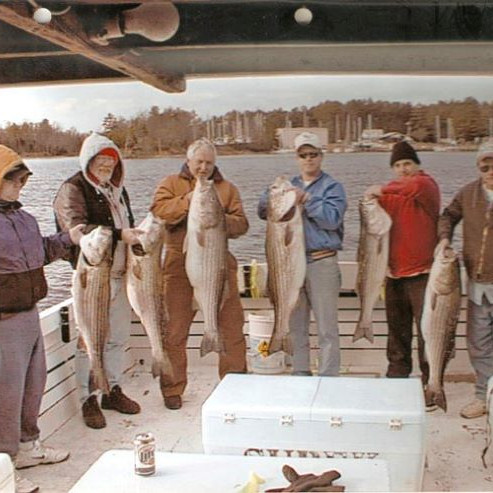 Fishing Charter Pary posing with their fish